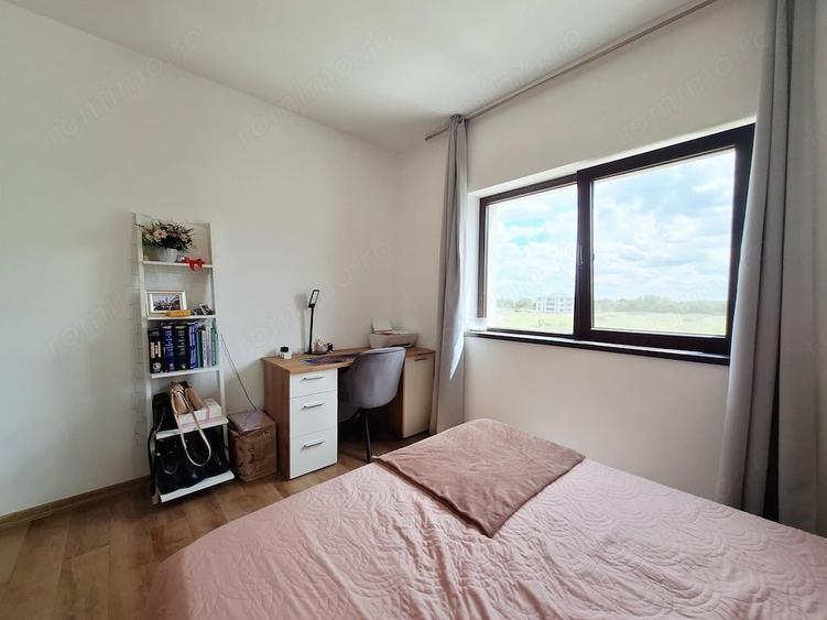 Spatios, 42 mp utili. Zona de living separata. Bucatarie inchisa. - 1