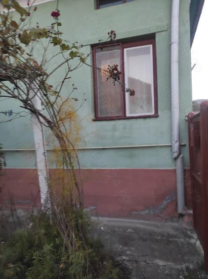 Casă cu Teren 1000 Mp în Central
