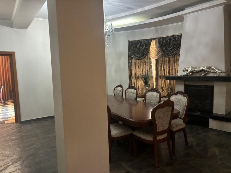 Casă cu 6 camere cu Teren 1000 Mp în Central