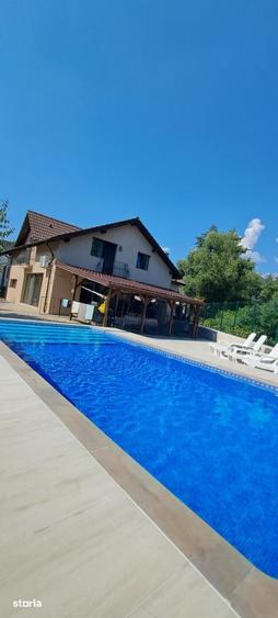 Casă cu 5 camere cu Teren 750 Mp în Valea Borcutului