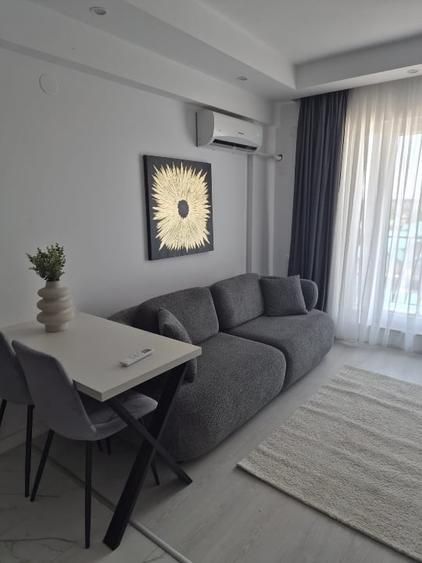 Apartament cu 2 camere semidecomandat, mobilat în Ștefăneștii de Jos