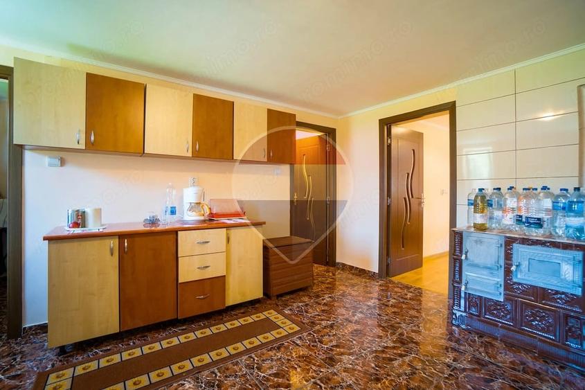 Casă cu Teren 565 Mp în Zizin