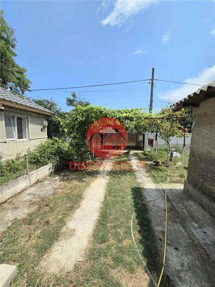 Casă cu 2 camere cu Teren 988 Mp în Vadu