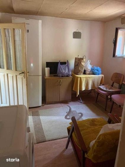 Casă cu 4 camere cu Teren 60 Mp în Coțofenii din Dos