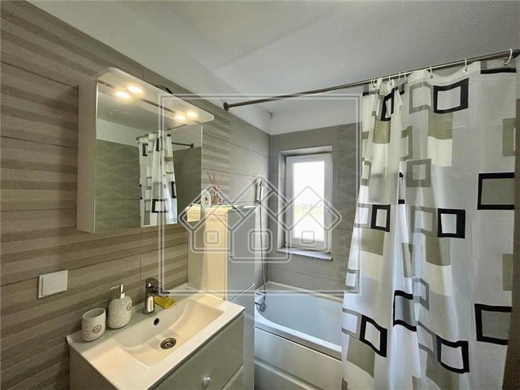 Apartament cu 2 camere, decomandat + balcon, 2 locuri de parcare - 11