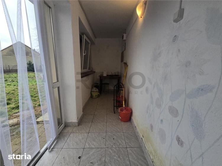 Casă cu 2 camere cu Teren 2685 Mp în Curtuișeni