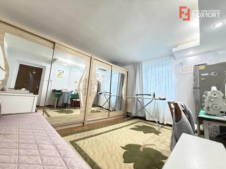 Apartament cu 2 camere semidecomandat, mobilat în Ronaț