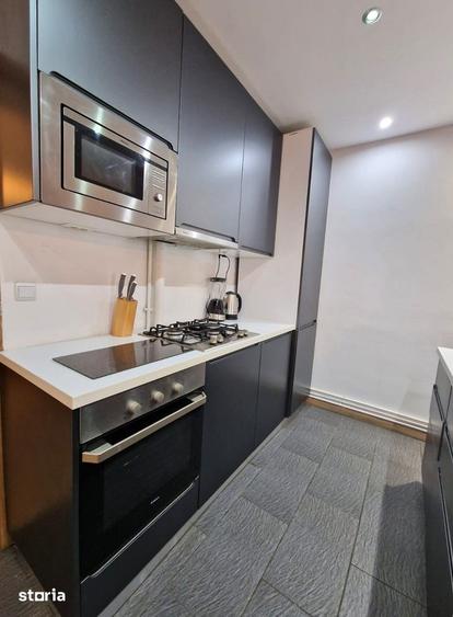 Apartament cu 3 camere în Romană