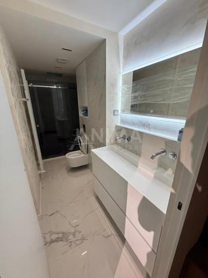 Apartament cu 2 camere semidecomandat, mobilat în Central