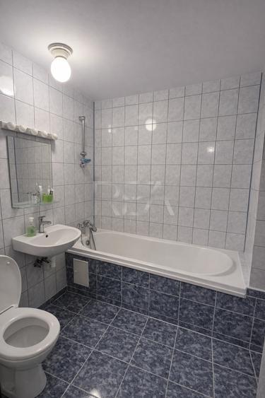 Apartament cu 3 camere semidecomandat, mobilat în Titan