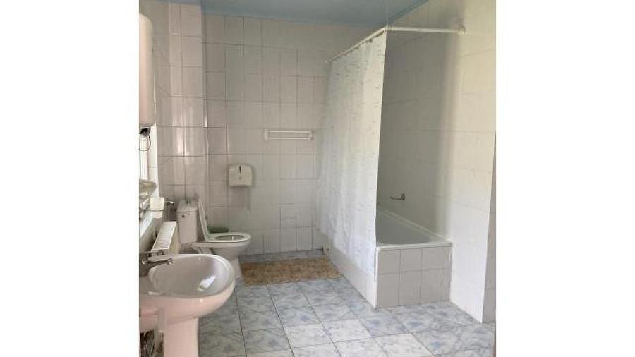 Casă individuală cu 10 camere cu Teren 1200 Mp în Central