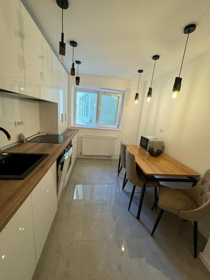 Apartament cu 2 camere semidecomandat, mobilat în Moșilor