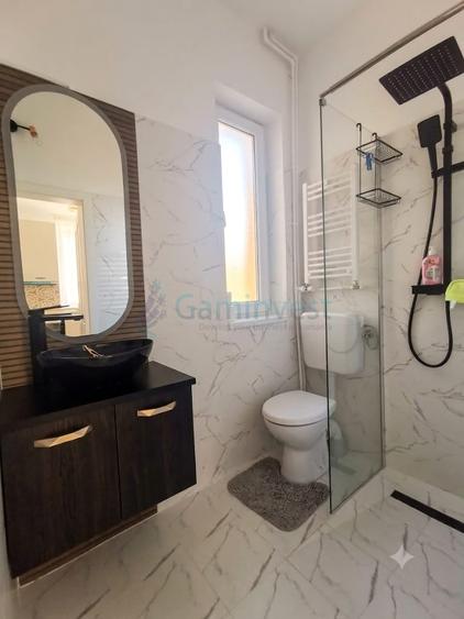 Apartament cu 2 camere semidecomandat, mobilat în Central