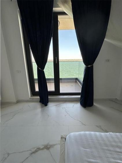 Apartament cu 2 camere decomandat, mobilat în Nord — fotografia 3