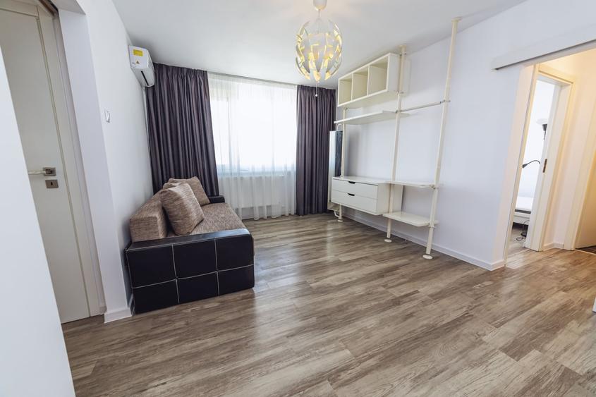 Apartament cu 3 camere semidecomandat, mobilat în Grivița