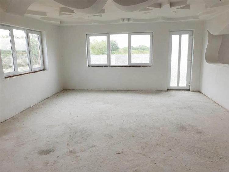 Casă cu 5 camere cu Teren 900 Mp în Tileagd