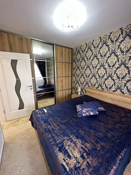 Apartament cu 3 camere semidecomandat, mobilat în Baciu