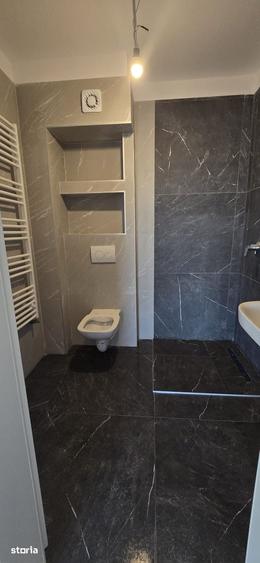 Apartament cu 3 camere în Tractorul