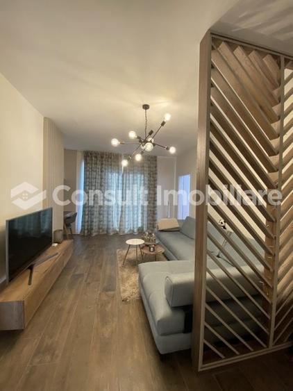 Apartament cu 2 camere semidecomandat, mobilat în Chinteni