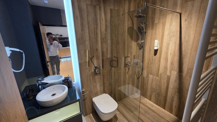 Apartament cu 2 camere semidecomandat, mobilat în Central