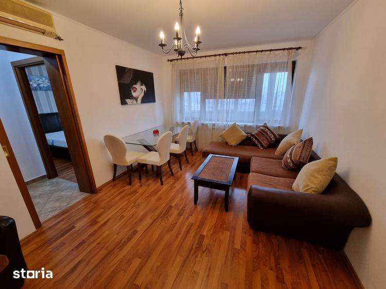 Apartament cu 3 camere semidecomandat în Dorobanți