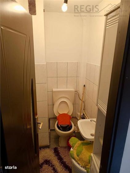 Apartament cu 3 camere decomandat în Tractorul