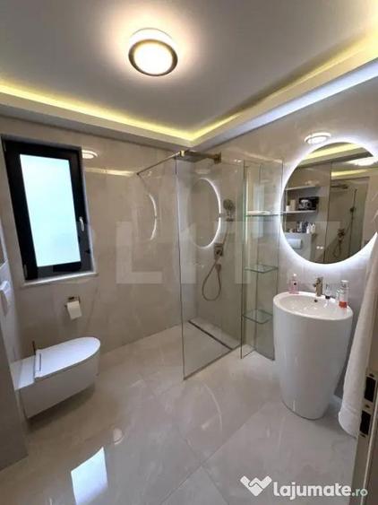 Apartament de lux,2 camere,2 bai,bloc nou,parter +parcare p - 15