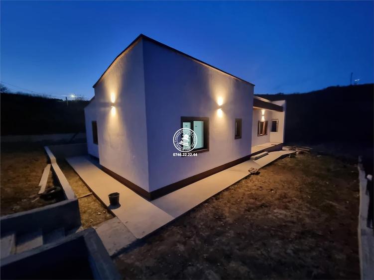 Casă cu 4 camere cu Teren 125.05000305176 Mp în Tomești