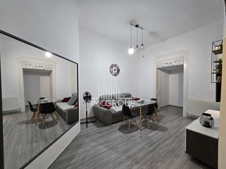 Apartament cu 3 camere semidecomandat, mobilat în Central