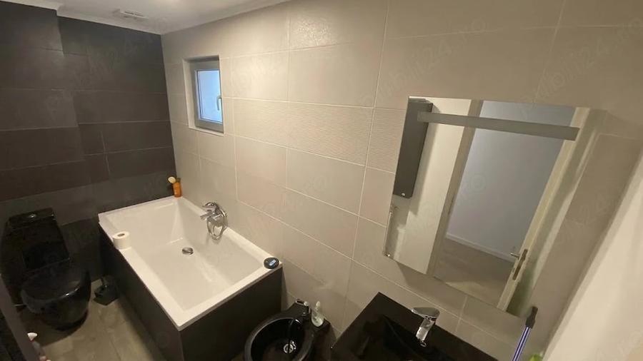 Casă cu 4 camere cu Teren 180 Mp în Central