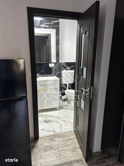 Apartament cu 2 camere, mobilat în Central