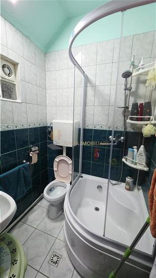 Casă individuală cu 4 camere cu Canalizare în Grigorescu