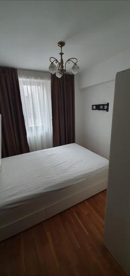 Apartament cu 4 camere semidecomandat, mobilat în Central