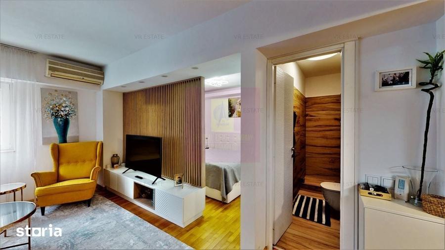 Apartament cu 3 camere în Romană