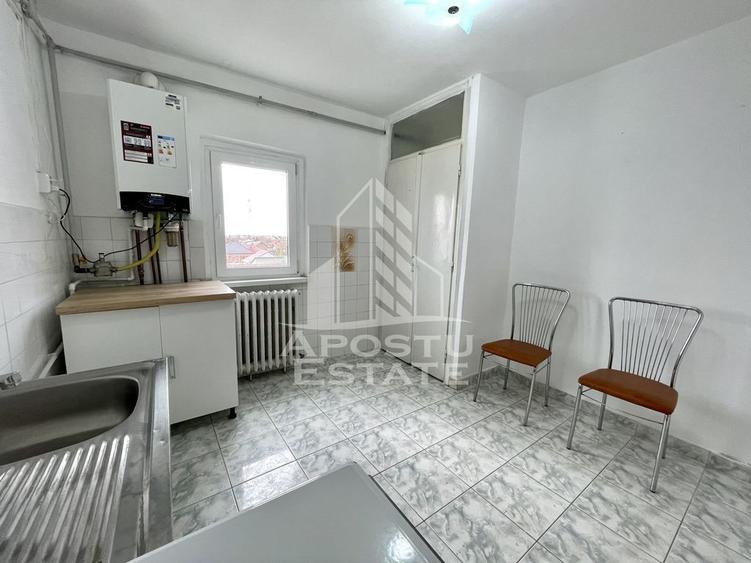 Apartament cu 3 camere decomandat în Buziașului