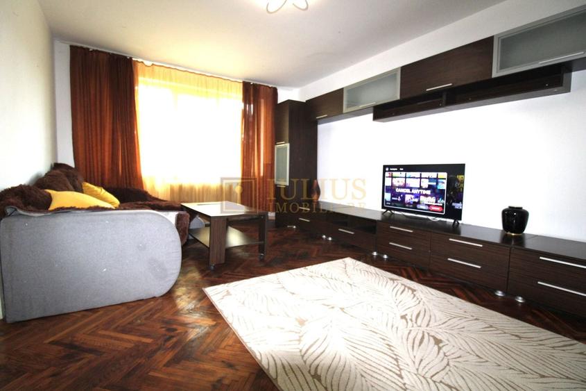 Apartament cu 4 camere semidecomandat, mobilat în Central