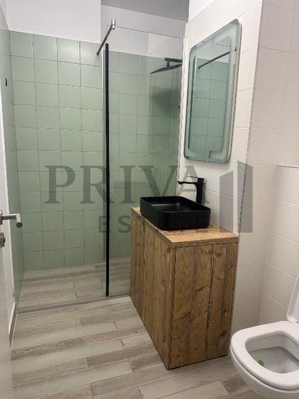 Apartament cu 2 camere semidecomandat, mobilat în Take Ionescu