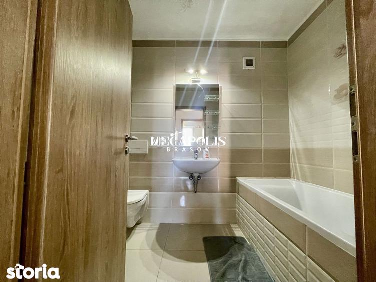 Apartament cu 2 camere decomandat în Tractorul