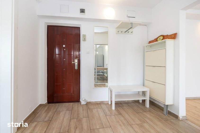 Apartament cu 3 camere semidecomandat, mobilat în Central