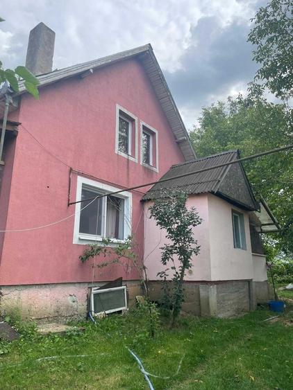 Casă cu 4 camere în Cuci