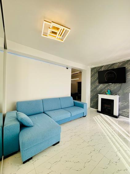 Apartament cu 2 camere semidecomandat, mobilat în Central