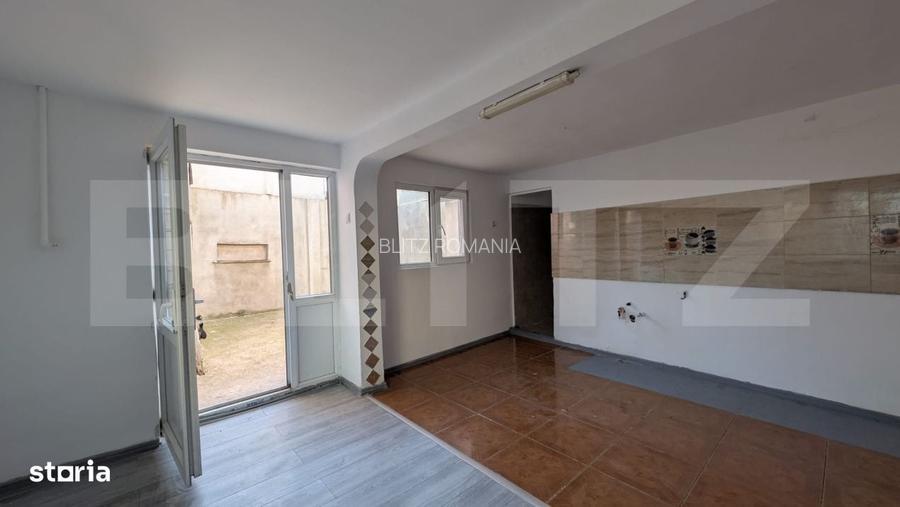 Casa cu 2 camere si mansarda ,plus bucatarie de vara .