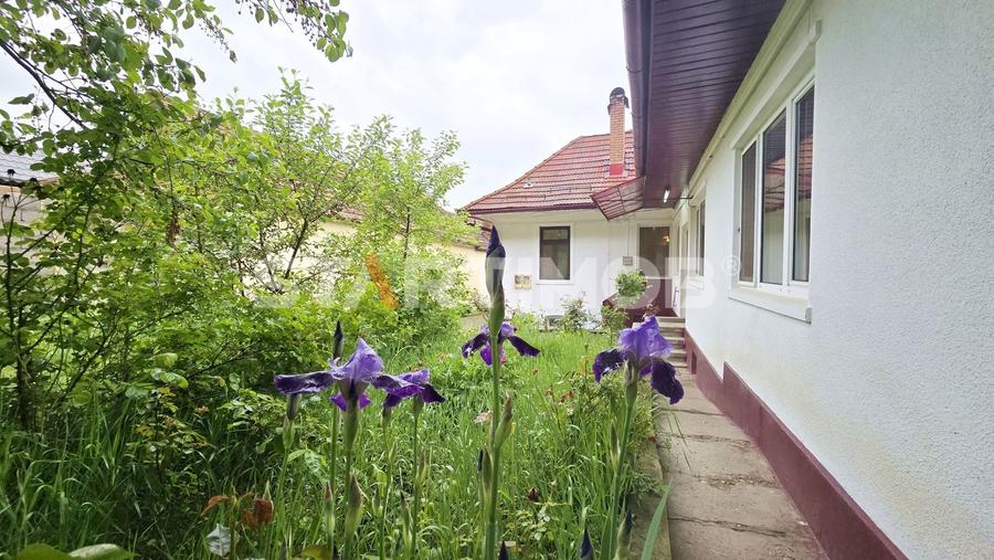 Casă individuală cu 5 camere cu Canalizare în Caragiale
