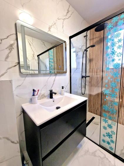 Apartament cu 2 camere semidecomandat, mobilat în Florești