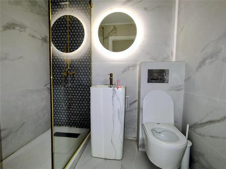 Apartament cu 3 camere decomandat în Titan