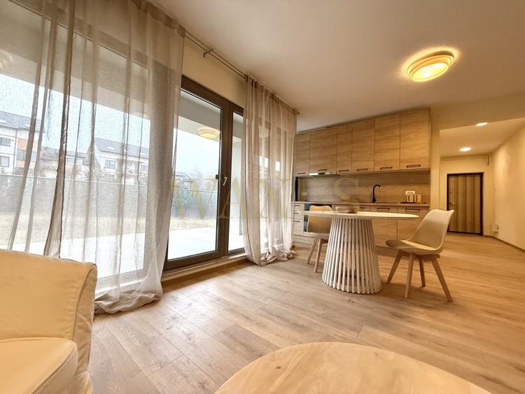 Apartament cu 3 camere semidecomandat, mobilat în Borhanci