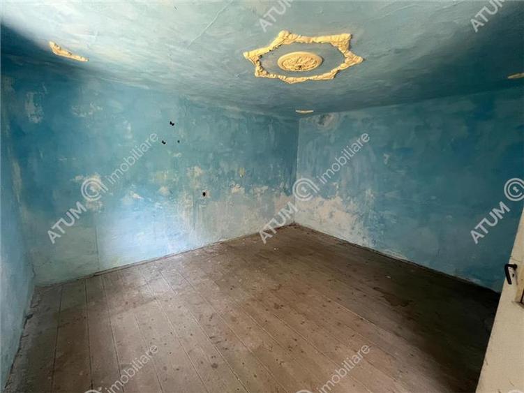 Casă individuală cu 5 camere cu Teren 489 Mp în Central
