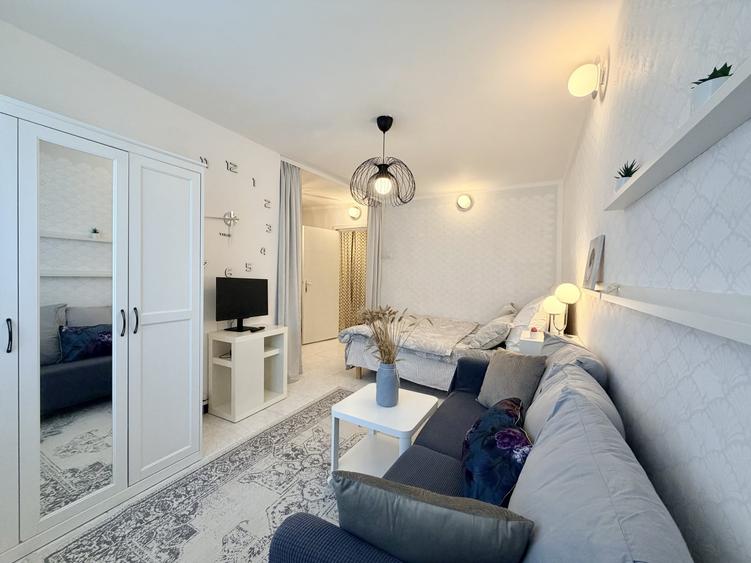 Cozy Studio luminos in Banu Manta - Victoriei cu pat si canapea - 1