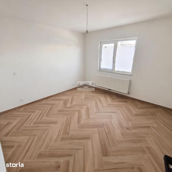 Apartament cu 4 camere decomandat în Străoane