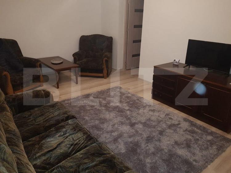 Apartament cu 2 camere semidecomandat, mobilat în Central